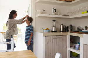 Picture of mom with son in kitchen